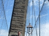 At the Brooklyn Bridge. It\'s held up by magic.